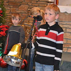 Christmas pageant boy with bell image
